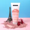 Freeman French Pink Clay peel-off mask tube with pink clay powder on surface