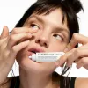 Model applying Caffeine Eye Cream