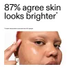 Close-up of a person's face with text indicating clinical study finding looks brighter after using 15% Vitamin C + EGF Serum