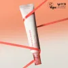 A tube of Centella 5% Niacinamide Radiance  Gel Cream 40g with Peta and vegan approved logos on a white and orange background.