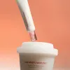 A tube and a jar of Centella 5% Niacinamide Radiance  Gel Cream 40g and 90g on a white and orange background.
