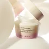 A opened jar of haruharu wonder Black Rice 5 Ceramide Barrier Moisturizing Cream on a white background