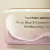 A jar of haruharu wonder Black Rice 5 Ceramide Barrier Moisturizing Cream, with a capacity of 50ml, in white and purple jar with ceramide capsules on it.