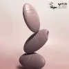 three stacked 50ml of haruharu wonder Black Rice 10 Hyaluronic Cream bottles on a light pink background with PETA and vegan approval logo.