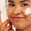 Woman applying 50ml of haruharu wonder Black Rice 10 Hyaluronic hydrating and moisturizer with no stickiness or heaviness Cream to her face with text highlighting product benefits.