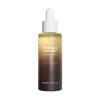 haruharu wonder black rice facial oil bottle with dropper on a white background