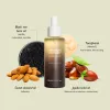haruharu wonder Black Rice Facial Oil with ingredients such as jojoba seed oil, vitamin E and almond oil on a light green background